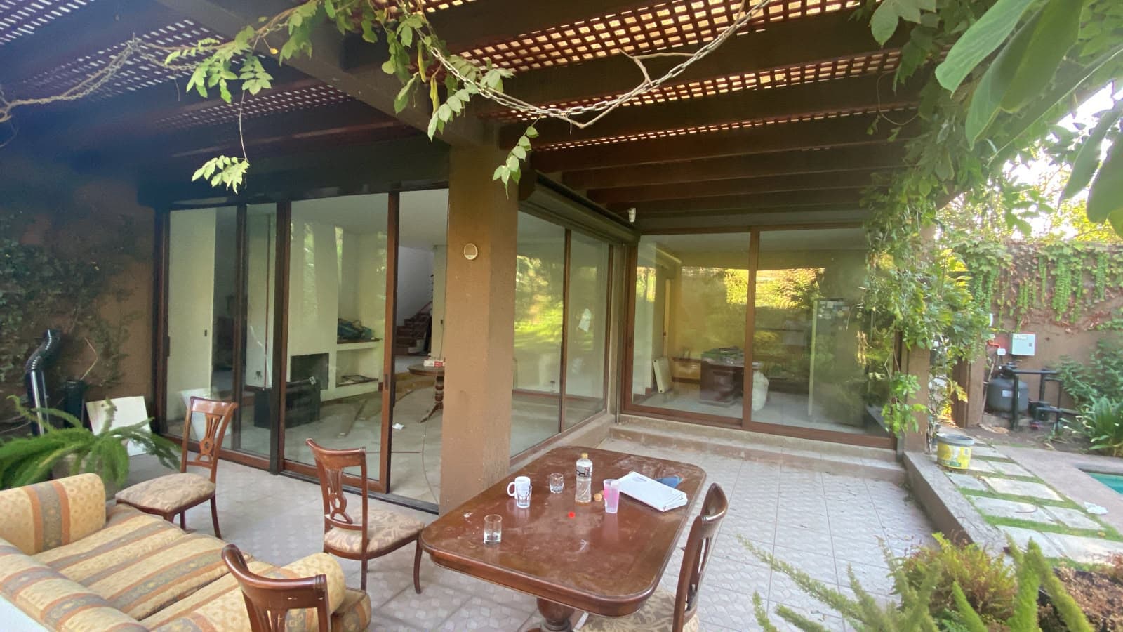 Cierre de cristal de living a terraza fabricado e instalado por Baikal